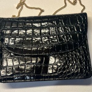 Genuine leather.  Black  Crocodile Embossed Clutch with Glossy Finish